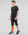 textil Hombre Pantalones de chándal Puma ESS+ BlOCK SWEATPANT TR Negro / Naranja